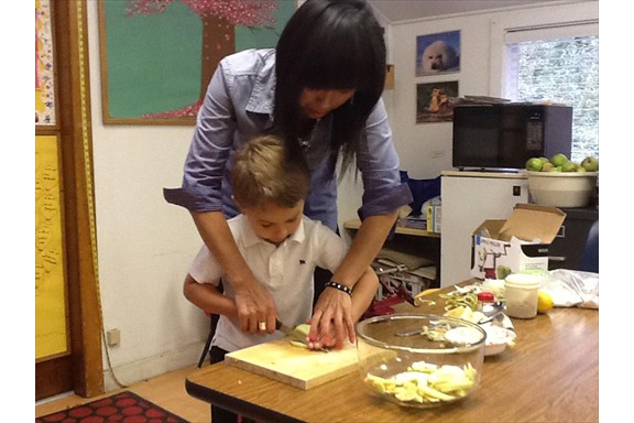 Cooking - PreK and K students learn to use a knife